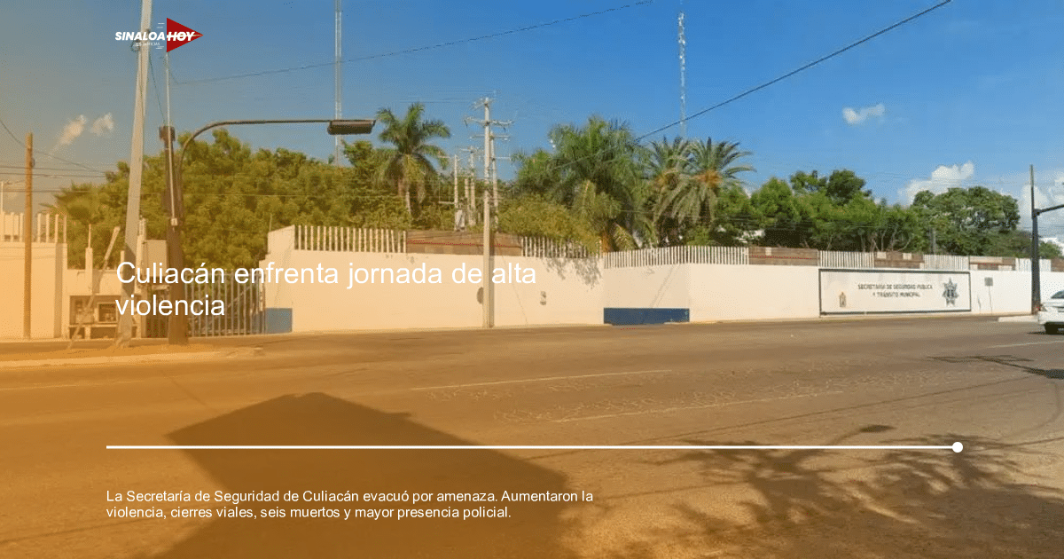 Calle en Culiacán con pared blanca, palmeras y semáforo, vinculada a la Secretaría de Seguridad.