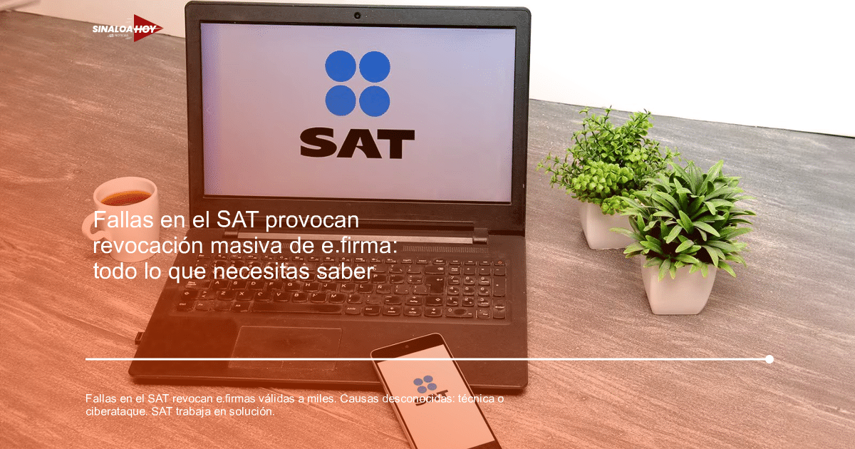 Laptop con logo del SAT, taza de café y teléfono móvil sobre mesa gris con plantas.