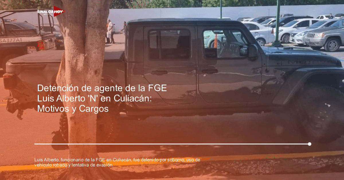 Camioneta gris oscura estacionada junto a un árbol, relacionada con un arresto en Culiacán.