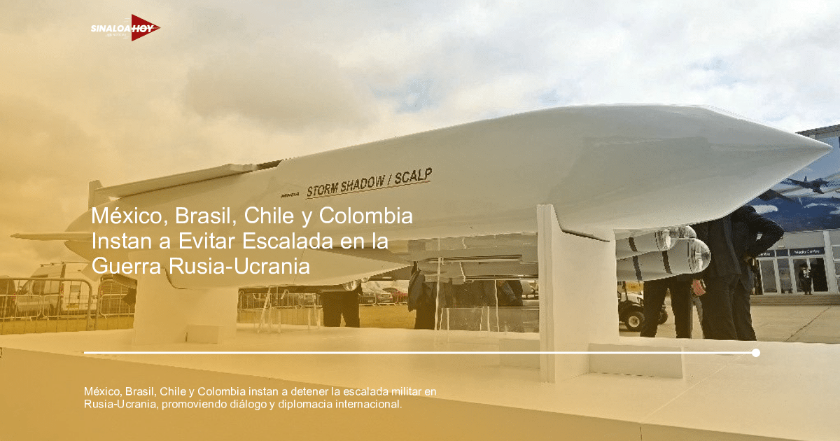 Modelo de misil Storm Shadow en exhibición con personas al fondo en un evento militar.