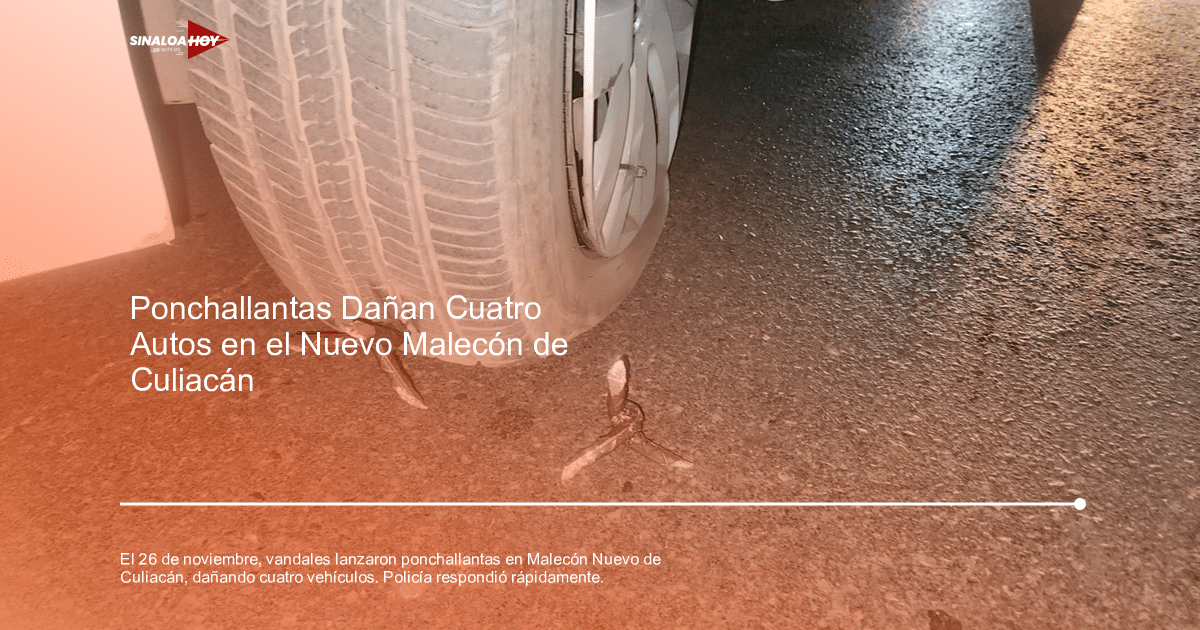 Neumático de vehículo sobre pavimento con ponchallantas metálicos debajo, relacionado con vandalismo en Culiacán.