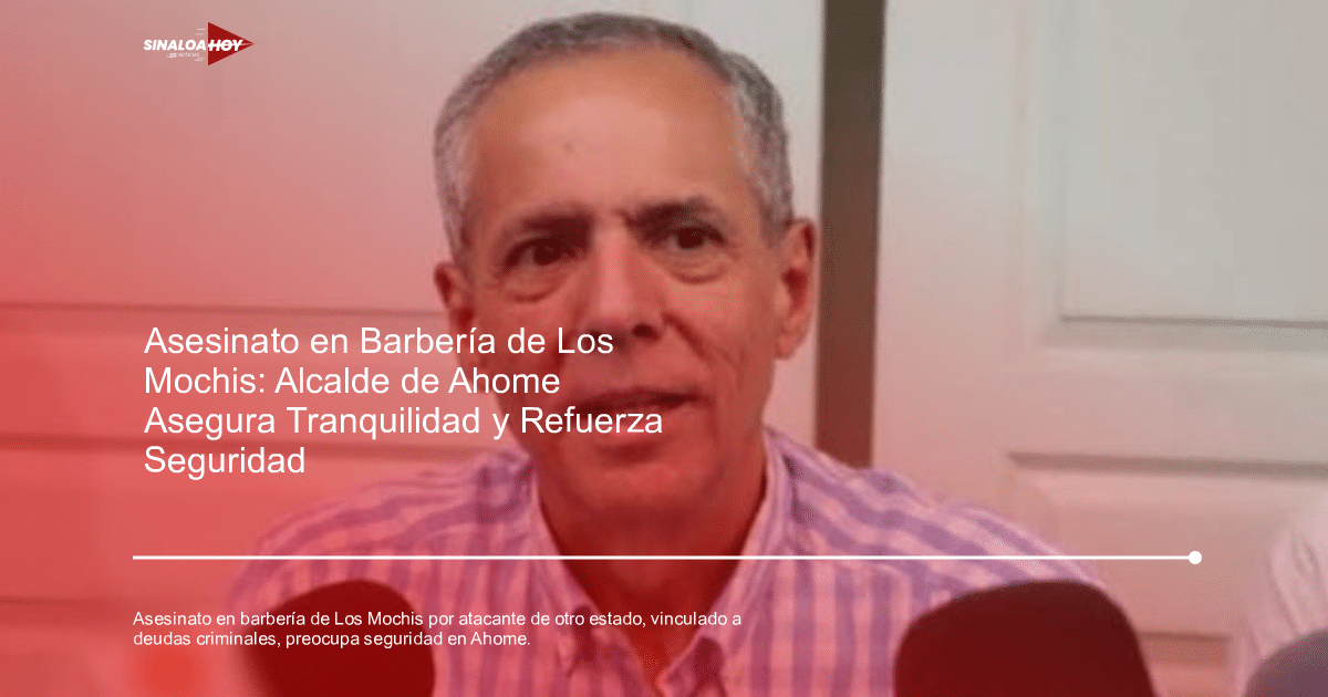 Hombre sentado en conferencia de prensa con fondo de paredes claras