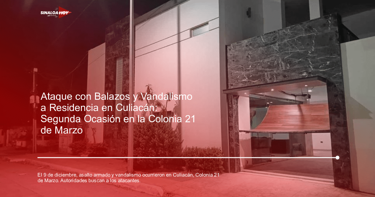 Casa moderna con fachada blanca y detalles en piedra oscura, iluminada de noche.