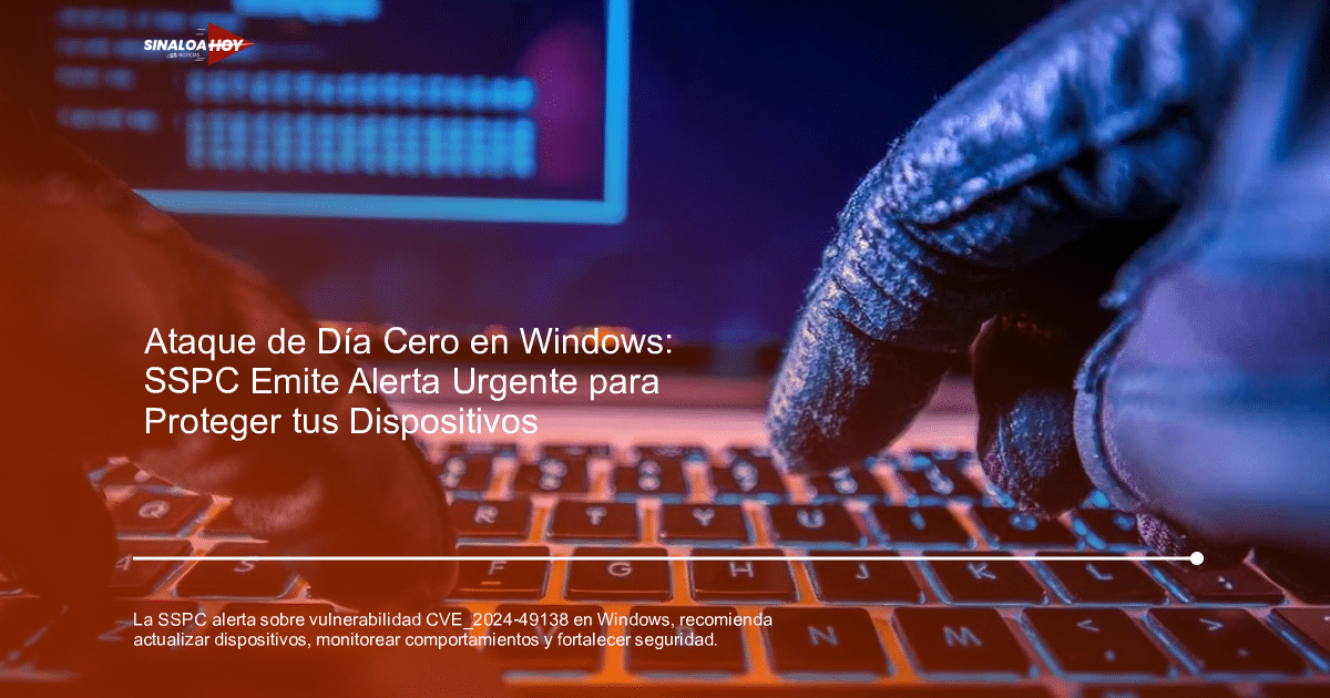 Manos con guantes sobre teclado de computadora, pantalla de laptop con diseño técnico al fondo.