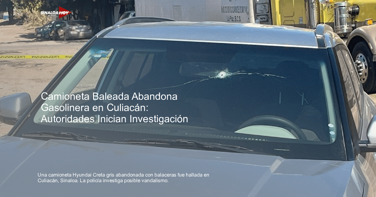 Automóvil con parabrisas fracturado en Culiacán, evidencia de balacera.