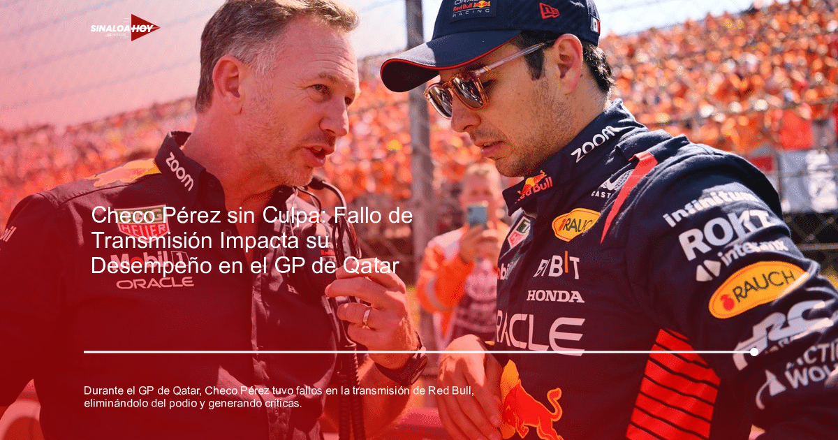 Dos personas conversando en una pista de Fórmula 1 con aficionados al fondo