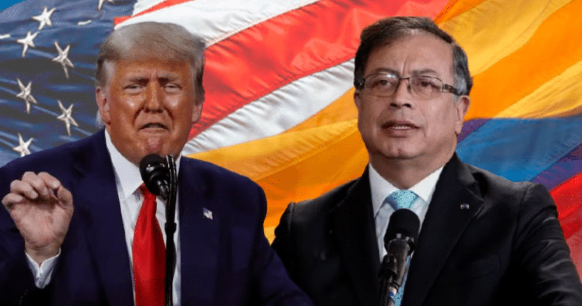 Dos personas hablando en micrófono frente a banderas de Estados Unidos y Colombia durante una conferencia diplomática.