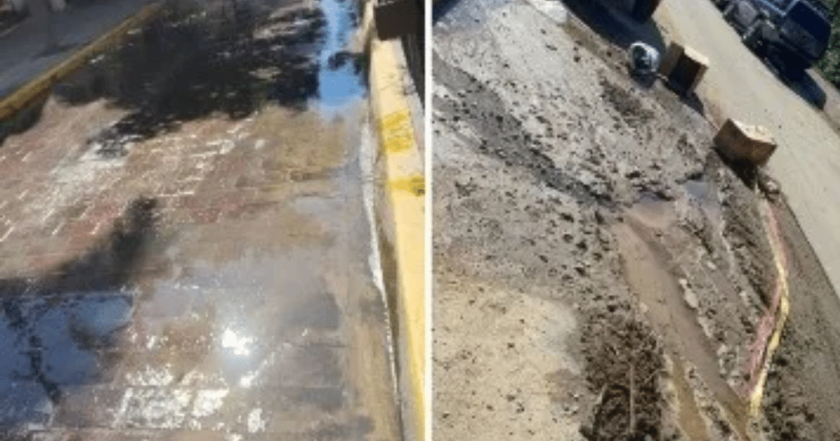 Panorámica de calle con pavimento mojado y área desmantelada por fuga de agua en Mazatlán.