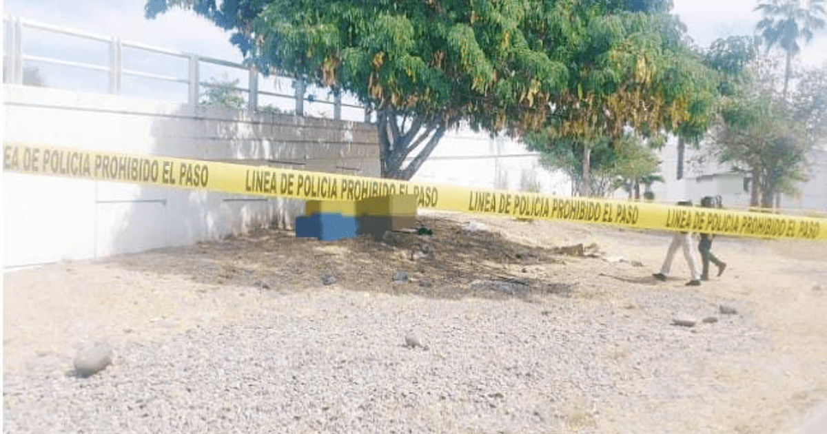 Escena al aire libre con cinta amarilla de 'prohibido el paso' en Culiacán, relacionada con un incidente.