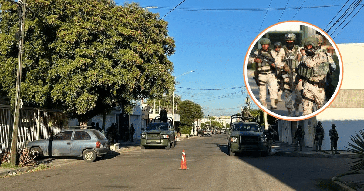 Calle en Culiacán con vehículos y fuerzas de seguridad durante operativo policial