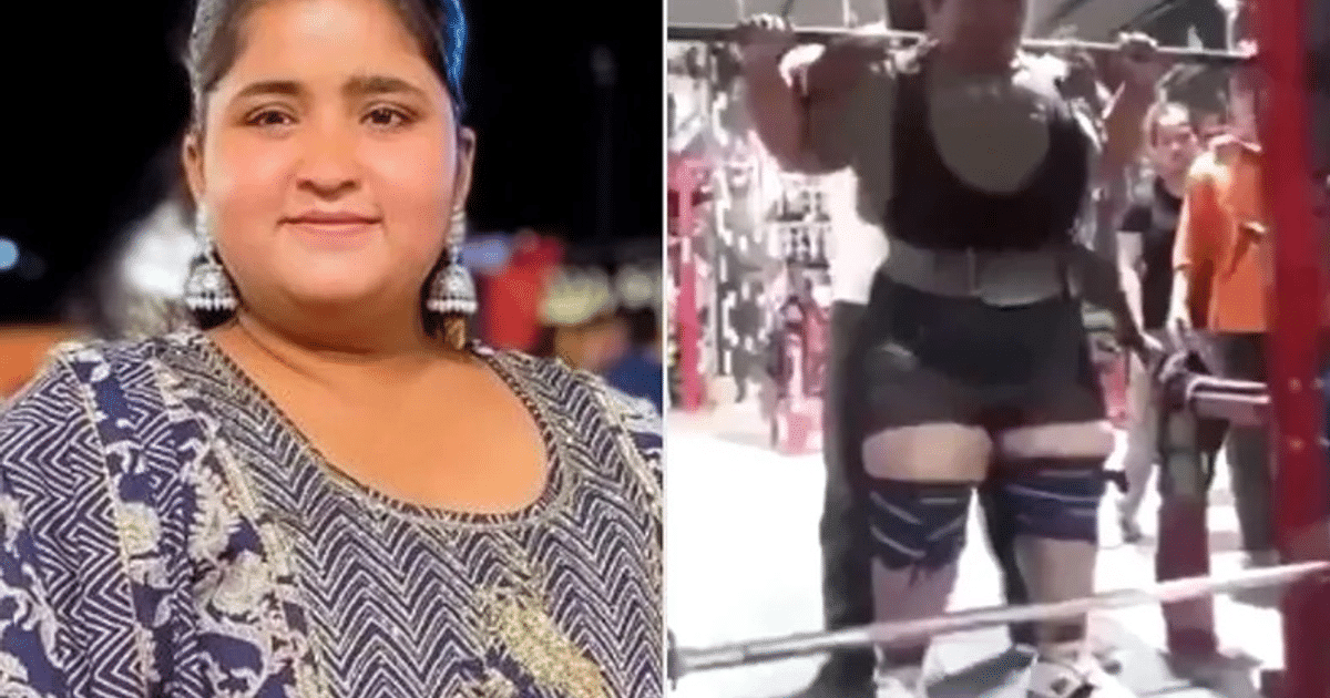 Persona sonriendo y levantando pesas en el gimnasio