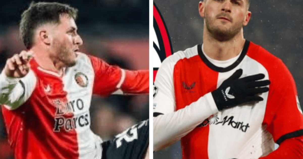 Dos futbolistas en acción con camisetas rojas y blancas, uno con la mano sobre el corazón, en un partido de fútbol.