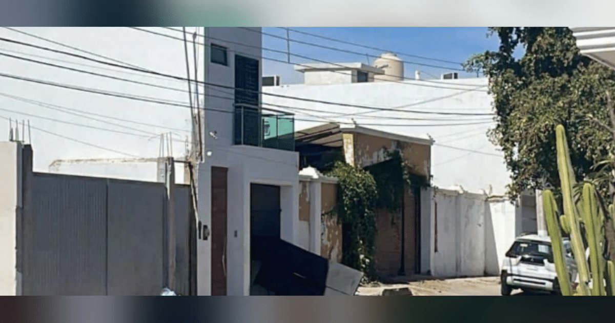 Calle en Culiacán con muros blancos y coche estacionado, relacionada con operativo militar.