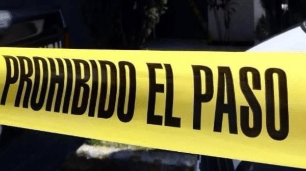 Cinta amarilla de 'PROHIBIDO EL PASO' en escena de investigación en Ahome