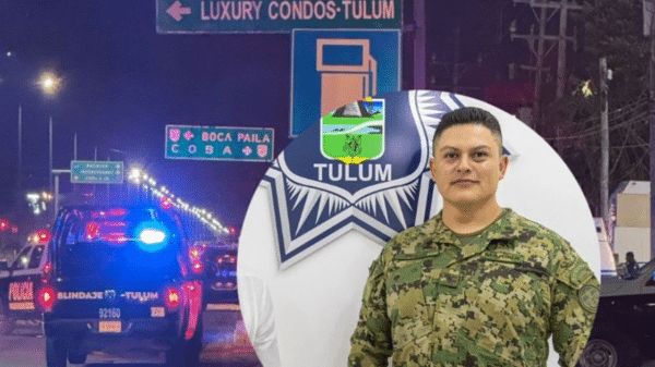 Entorno urbano nocturno en Tulum con vehículos policiales y oficial de seguridad tras incidente armado.