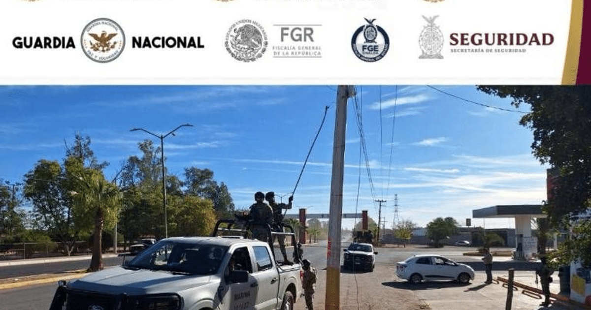 Operativo de seguridad en Sinaloa con vehículo de la Guardia Nacional y estructuras urbanas al fondo.