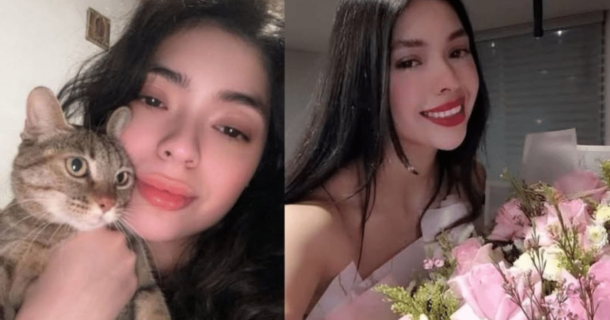 Persona sosteniendo un gato y un ramo de flores, simbolizando momentos de felicidad y afecto.