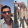 Cuatro personas grabando videos al aire libre, vinculadas a la visita de influencers al Rancho Izaguirre.