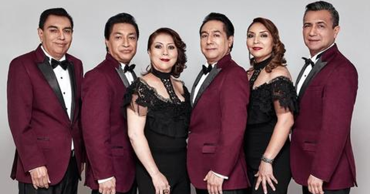 Cinco personas vestidas formalmente posan con expresiones serias, relacionadas con un asalto en la carretera México-Puebla.