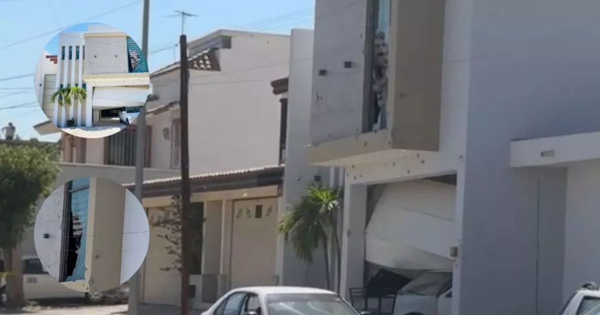 Fachada dañada de edificio residencial en Culiacán tras ataque armado, con vehículo y planta visibles.