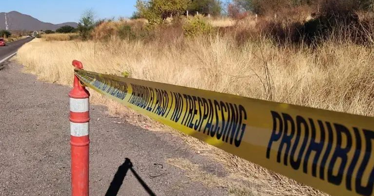 Cinta amarilla de advertencia en escena de crimen en La Cruz, Elota