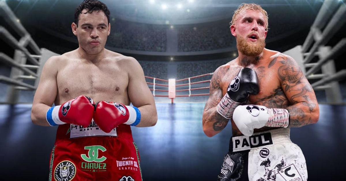 Dos boxeadores en el ring, uno con guantes rojos y otro con guantes negros, listos para pelear.