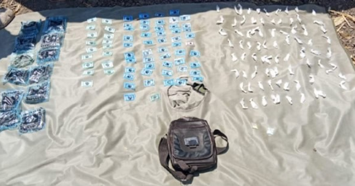 Paquetes y mochila negra incautados en operativo de Estación Dimas