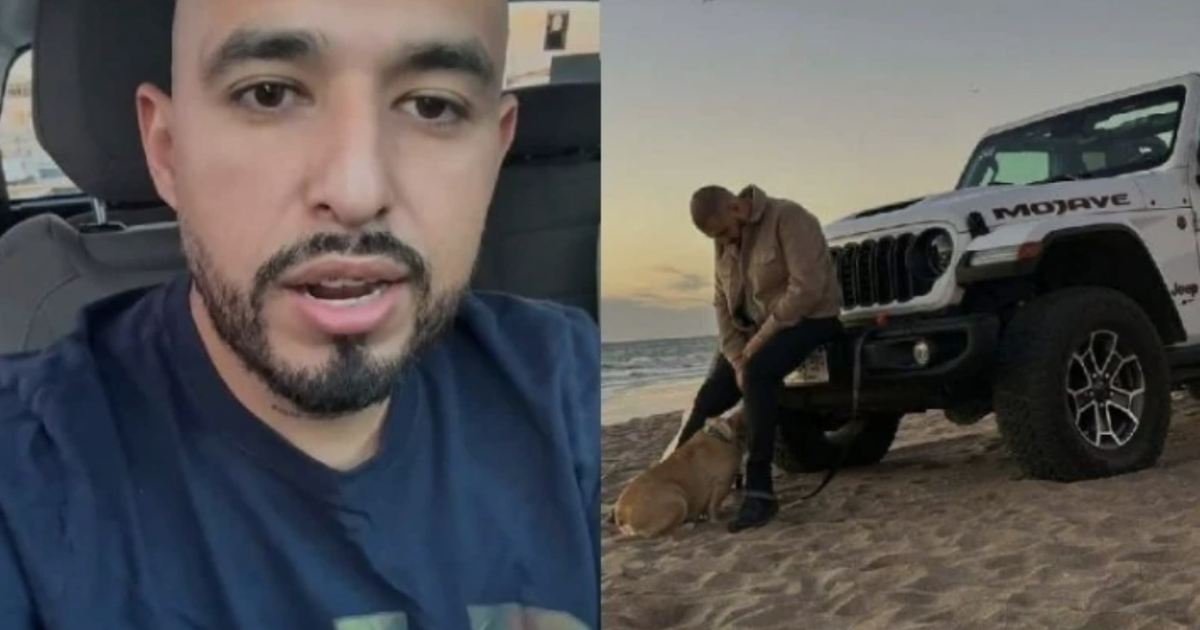 Persona hablando desde un vehículo y hombre con perro junto a un todoterreno blanco en la playa al atardecer