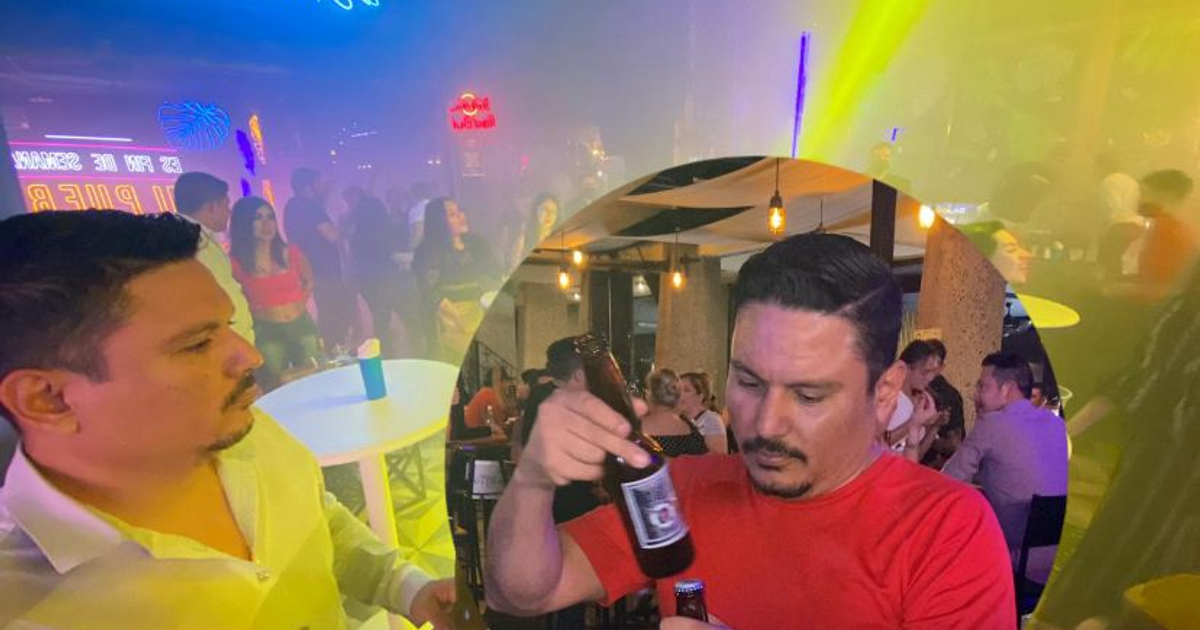 Ambiente de fiesta en Culiacán con personas bailando y socializando en un bar.