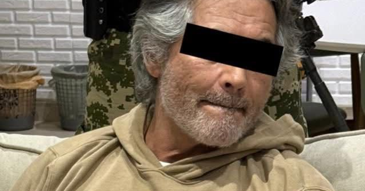 Hombre con cabello canoso y barba en sudadera beige, vinculado a la detención de Hernán Bermúdez Requena en Paraguay.