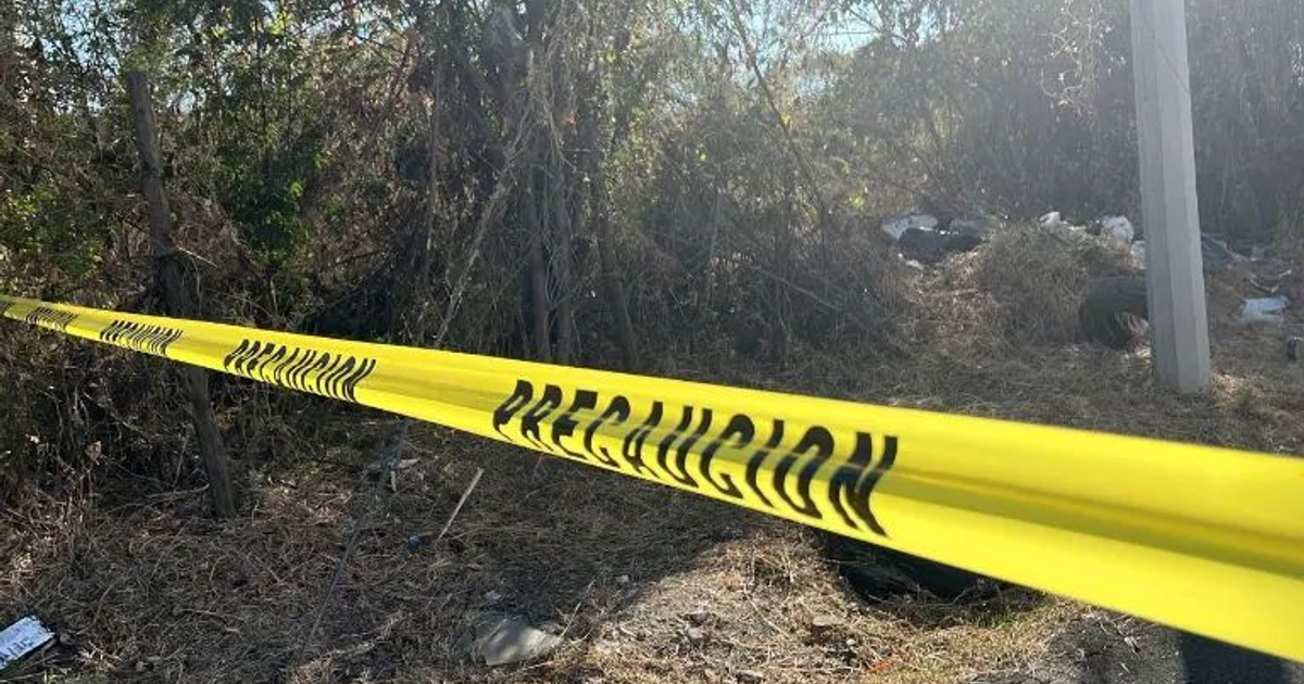 Cinta amarilla de precaución en escena de crimen en Culiacán