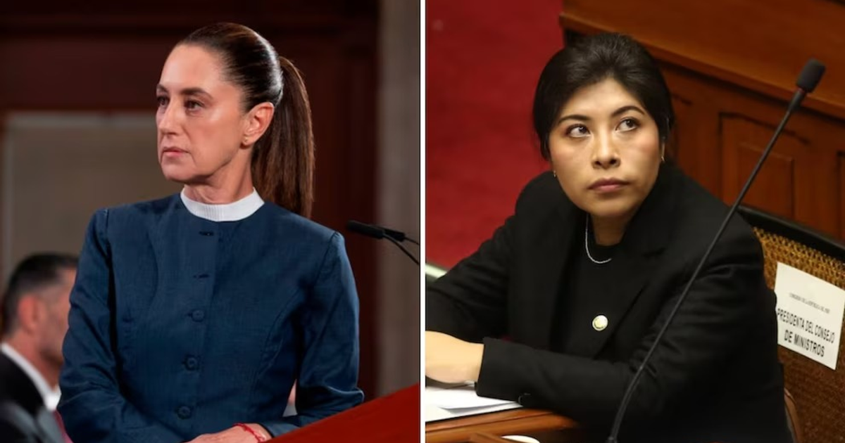 Dos mujeres en un entorno parlamentario, una en atuendo azul y otra en negro, en un contexto de debate político.