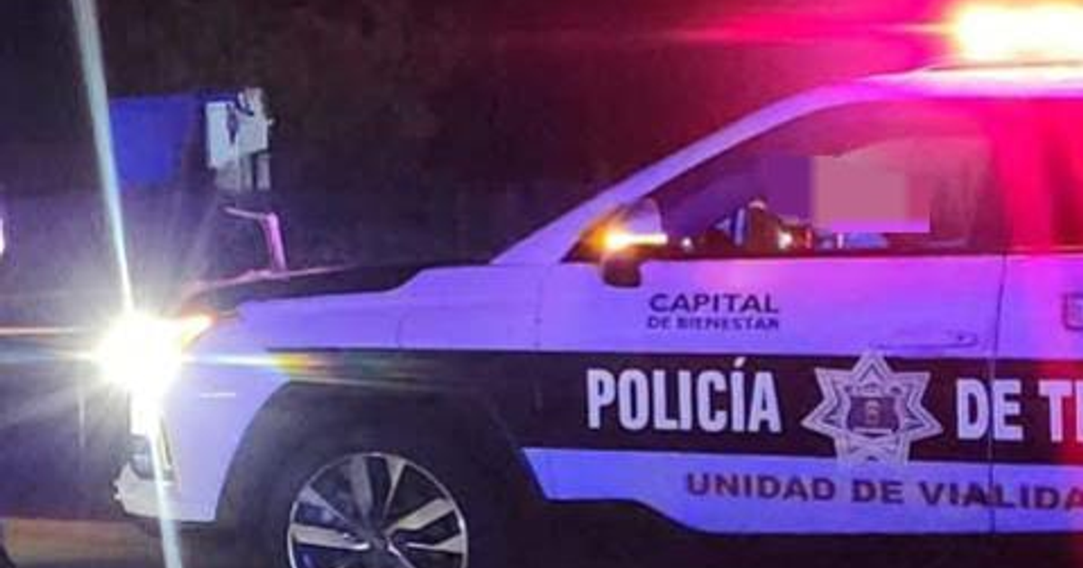 Vehículo policial de la Unidad de Viabilidad con luces encendidas en Arroyo Grande, escenario nocturno de crimen navideño en Culiacán.