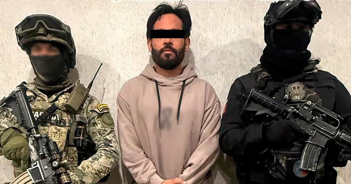 Soldados escoltando a detenido Edgar N. tras captura en Durango