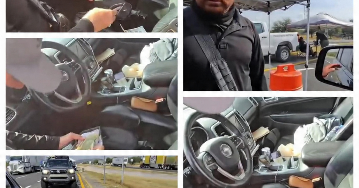 Oficial de policía en control vehicular durante revisión en carretera