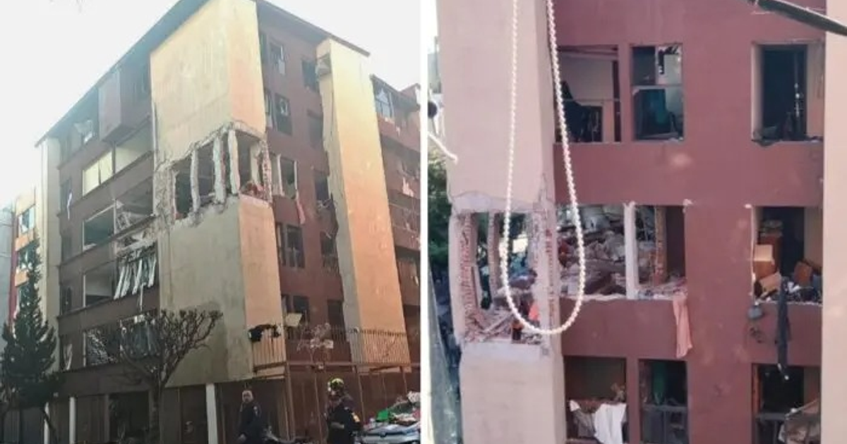 Edificio dañado por explosión en Paseos de Taxqueña, Ciudad de México, con escombros y personal de rescate.