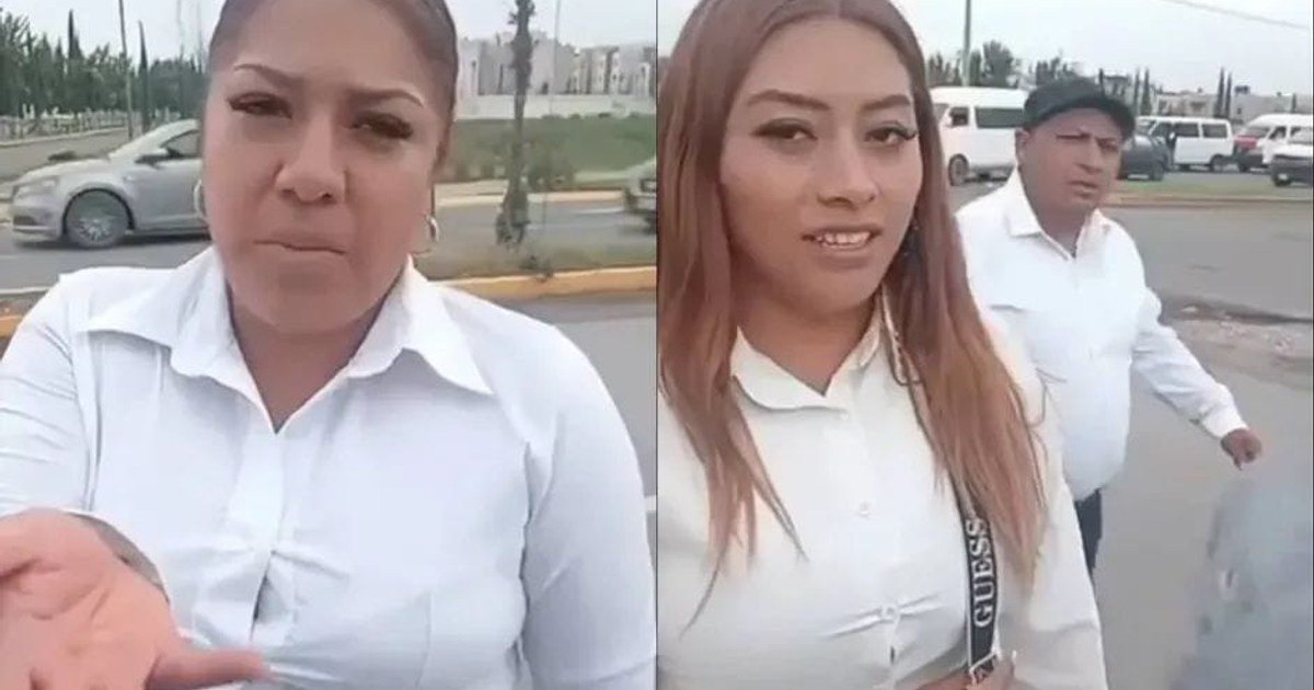 Dos mujeres y un hombre captados en un acto de extorsión con vehículos al fondo.