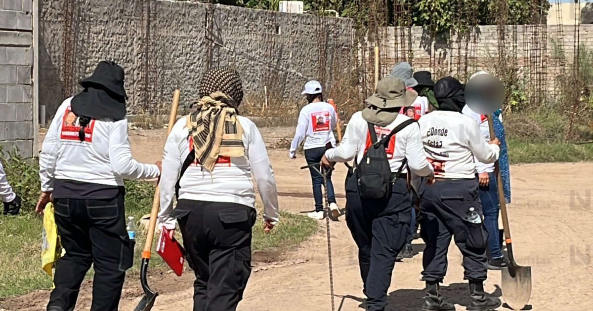 Personas con herramientas de rastreo en operativo